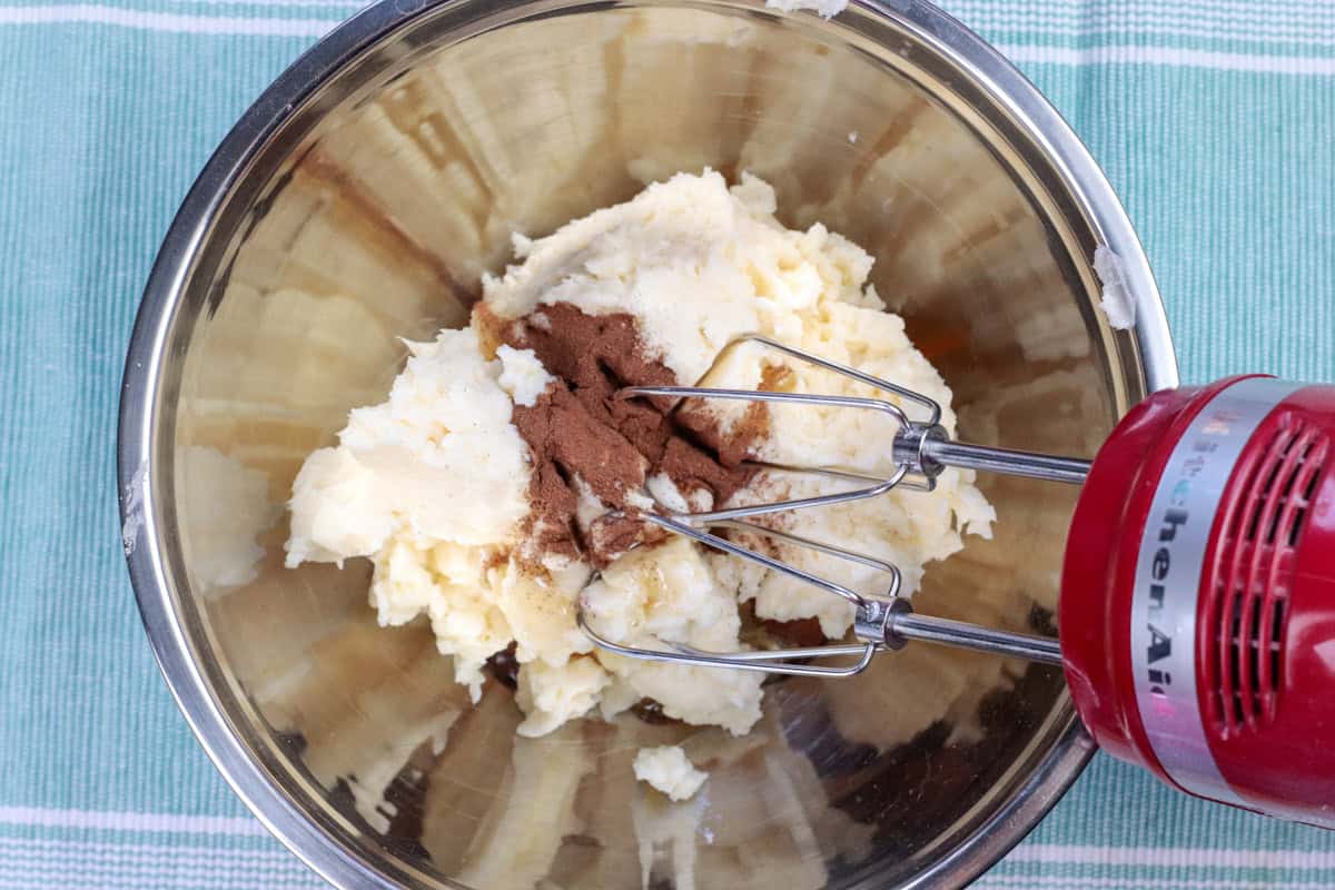 ingredients being blended in a mixing bowl