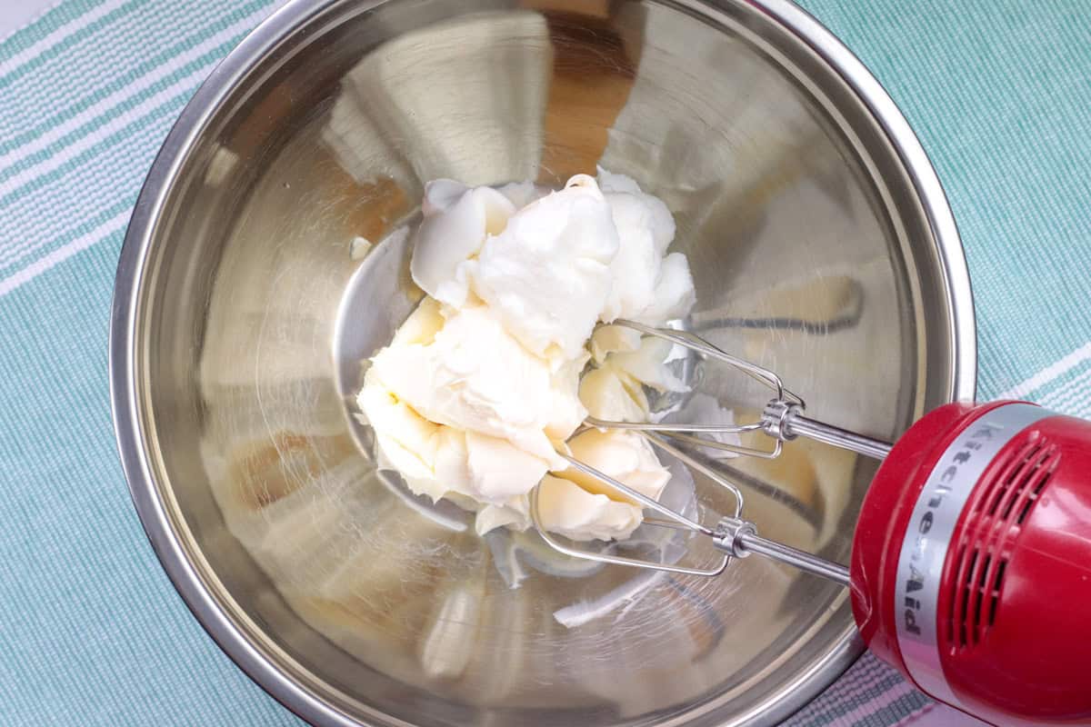 homemade frosting blended with hand mixer