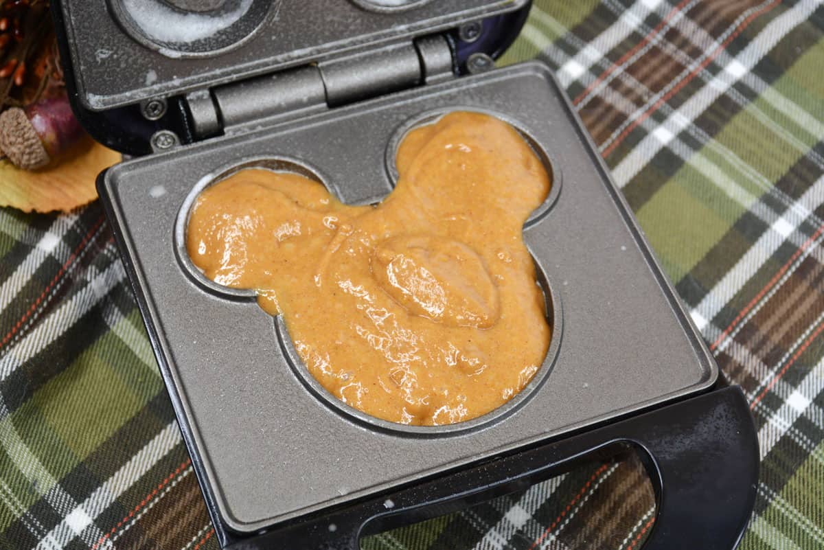 pumpkin spice batter in waffle iron