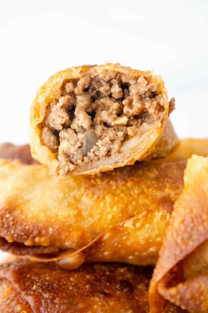close up of cheeseburger egg rolls