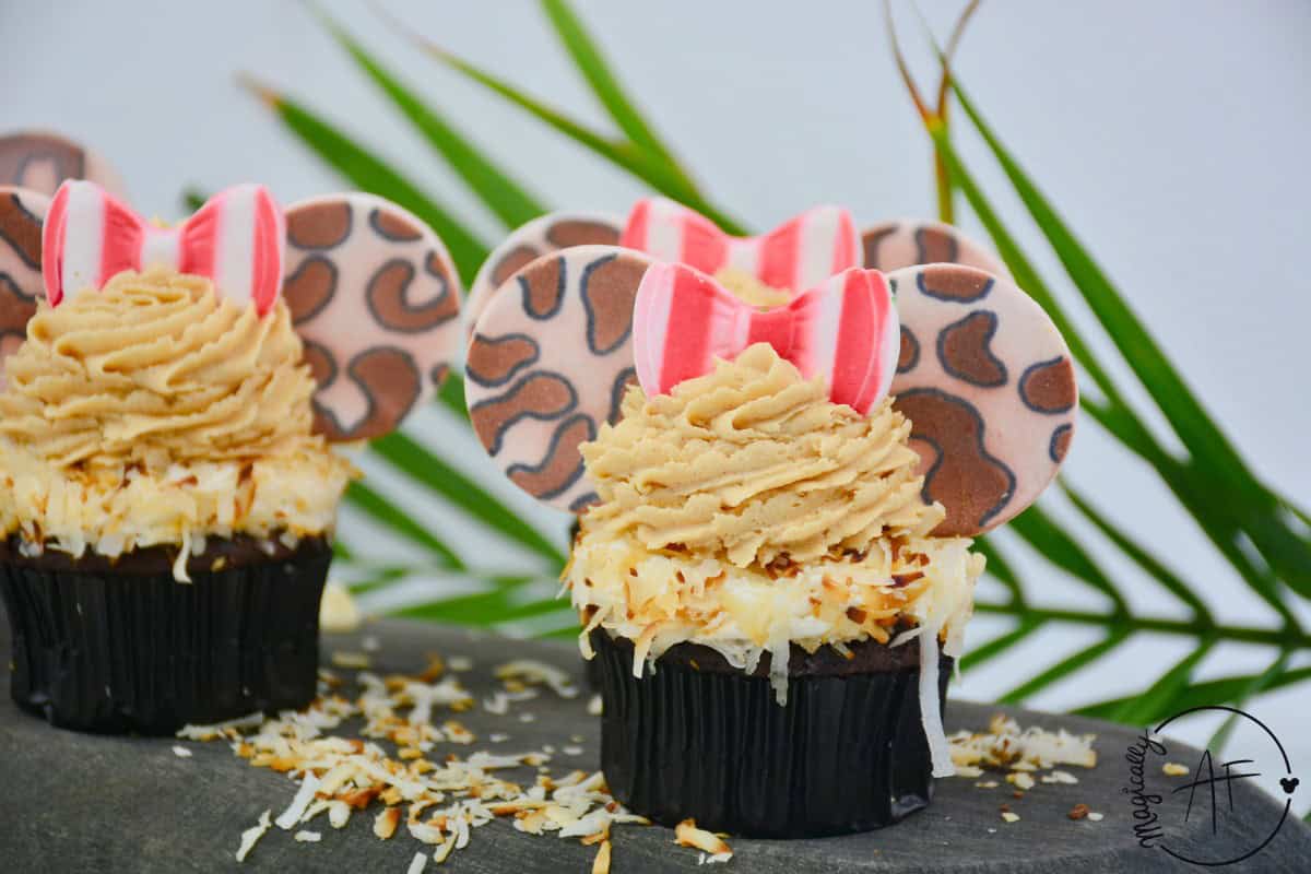 Disney Safari jungle cupcakes on a black platter